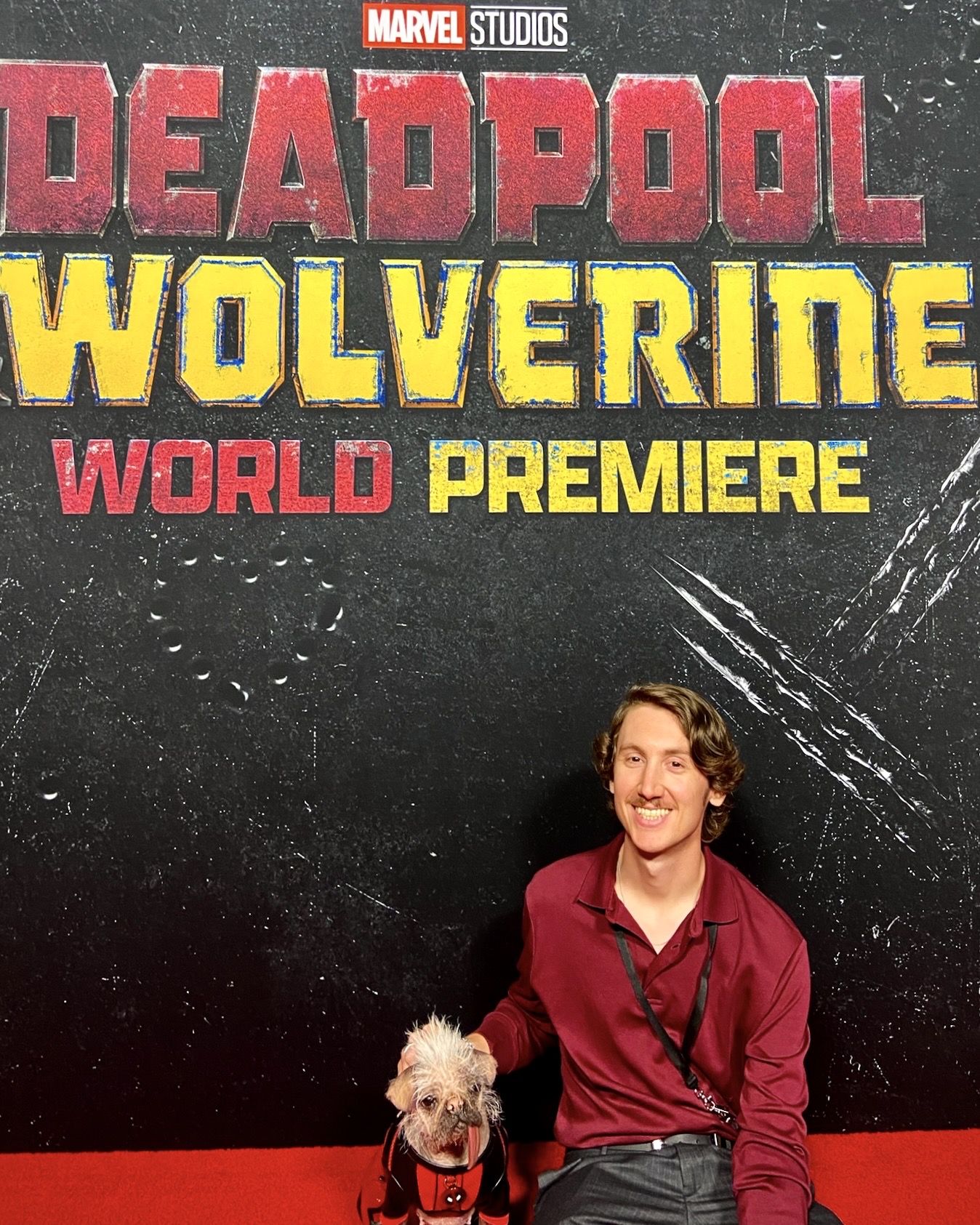 Derek poses with Dogpool at Deadpool Premiere in New York